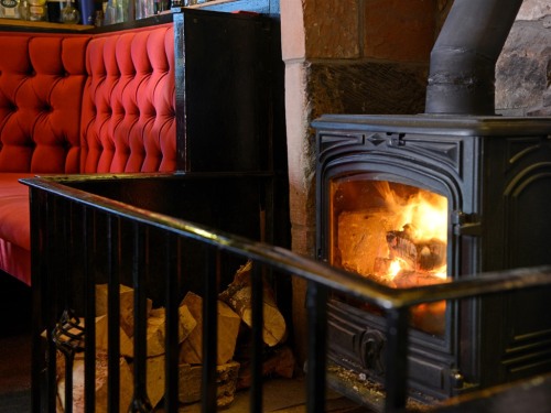 Wood burning stove in the bar