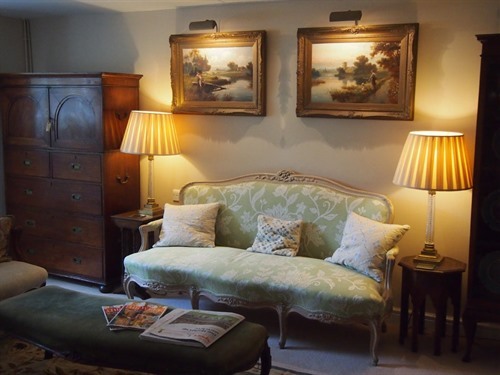 The sitting room is available to guests throughout the day and evening