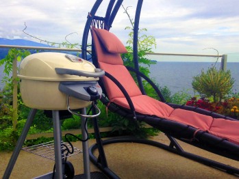 BBQ and lounge chair on Retreat Balcony