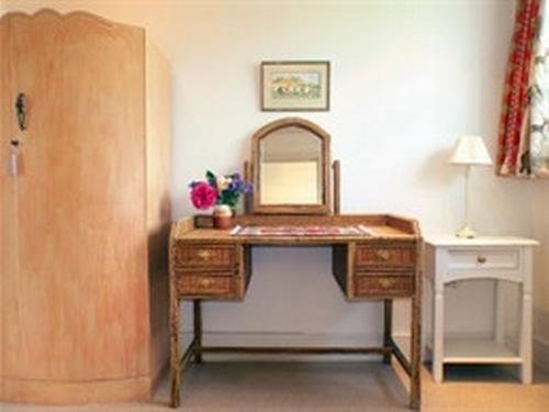The Gothic Room has a charming private dressing room with ample storage space.