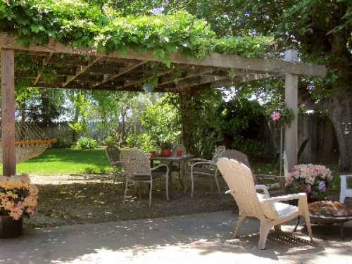 Vintner's tranquil backyard for relaxing and enjoying a glass of wine.