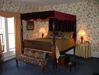 Room 1 with antique Queen Canopy Bed