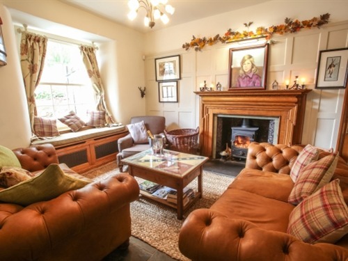 Enjoy a coffee or tea in our comfortable lounge by one of our fires