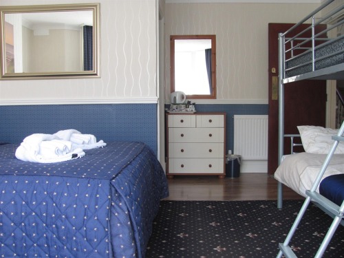 Room 6.Is another large spacious family/double room with ensuite shower,tea/coffee making facilities,colour tv,complimentary