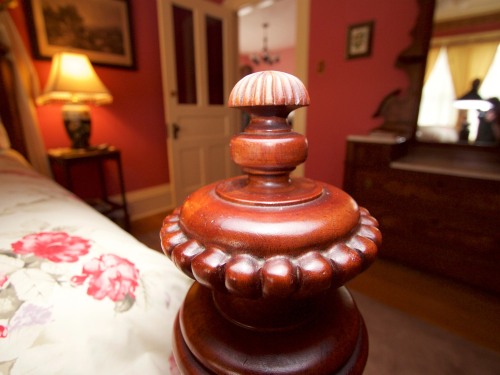 Closeup of bedstead, Red Romance Room