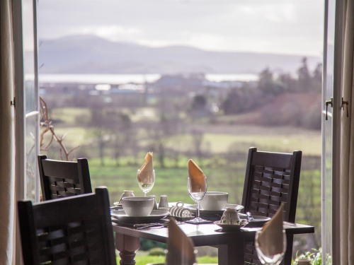 Breakfast is served daily onsite in The Plas Dining Room with panoramic views over the Glaslyn estuary to the sea and mountains beyond.
