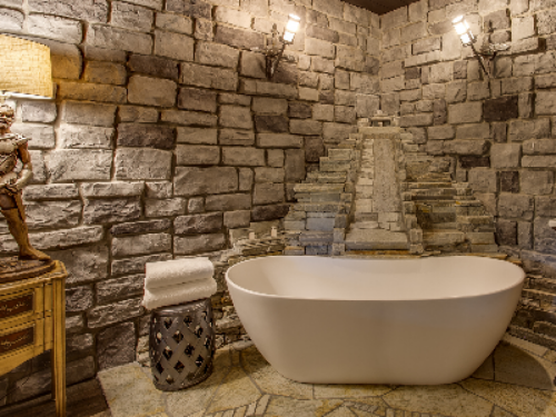 Castle Suite soaking tub with custom stone