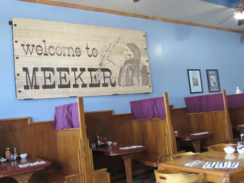 The old Welcome To Meeker Sign now hangs in our Café next door.