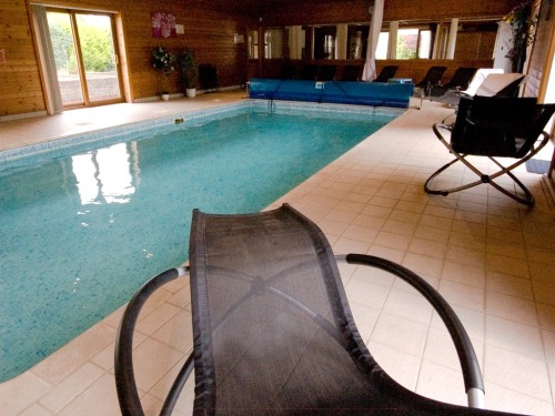 Relax in our pool rocking chairs and drift off to sleep by the indoor heated swimming pool