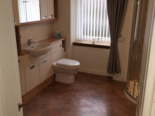 Large Upper bathroom with additional shower unit