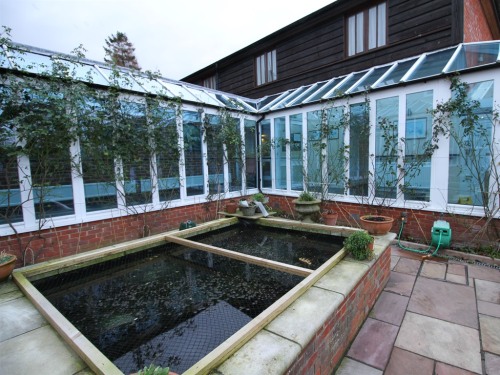 Part of the courtyard garden and rooms of Canterbury Hotel