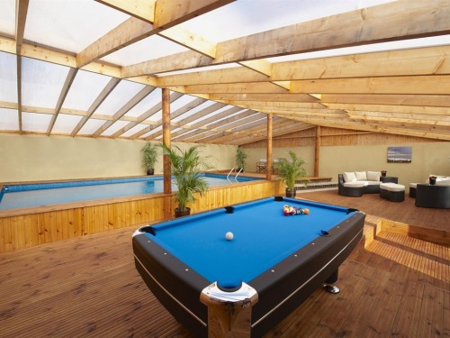The lesuire room with ,pool table and fussball table