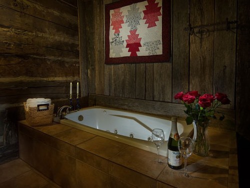 Relax in The Cabin's jetted tub while enjoying the historic Appalachian decor.