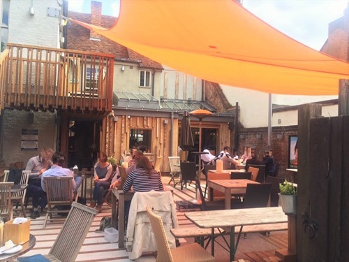 Dine al fresco on out fabulous terrace. Musicians can be found playing here throughout the summer.