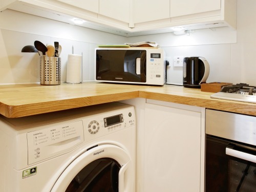 oven, washer dryer, microwave and dishwasher