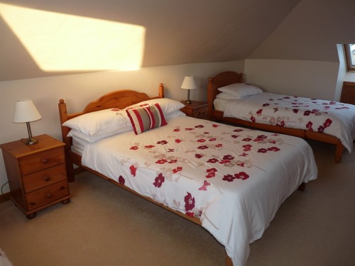 Large en-suite room with a double and 2 single beds