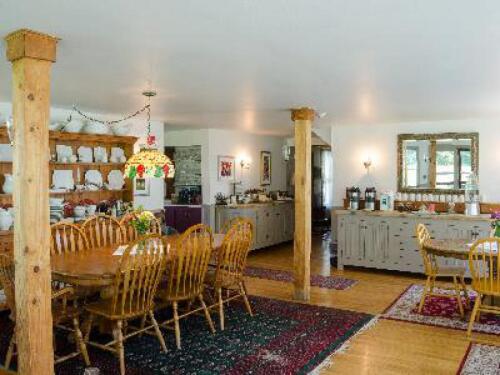 Enjoy breakfast in our spacious dining room. This is a great gathering space for guests.